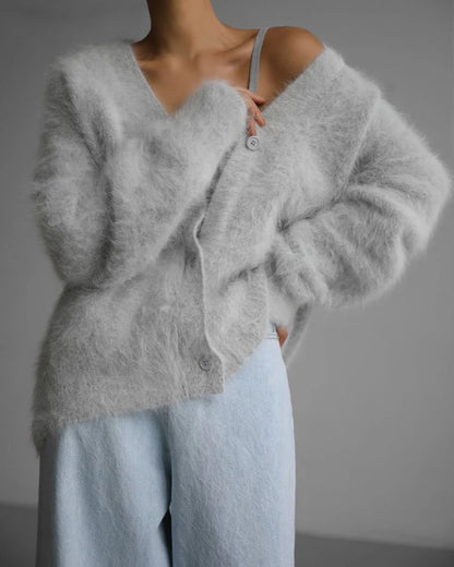 Cozy oversized cardigan with v-neck, button front, and variety of color options for women