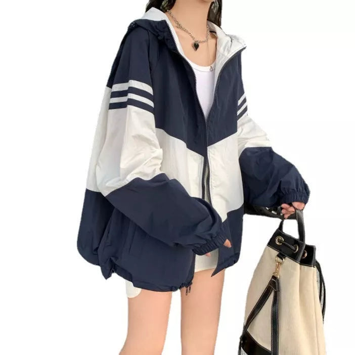 Women's lightweight hooded sun protection coat in blue, red, or orange