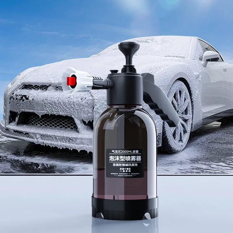 Black 2-litre hand-held foam sprayer with pump handle and two nozzles for car washing and gardening.
