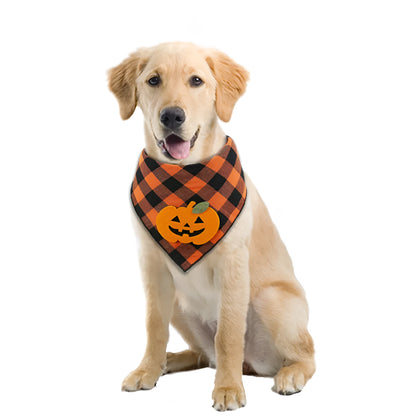 Orange plaid Halloween dog bandana with white skeleton and pumpkin felt appliques