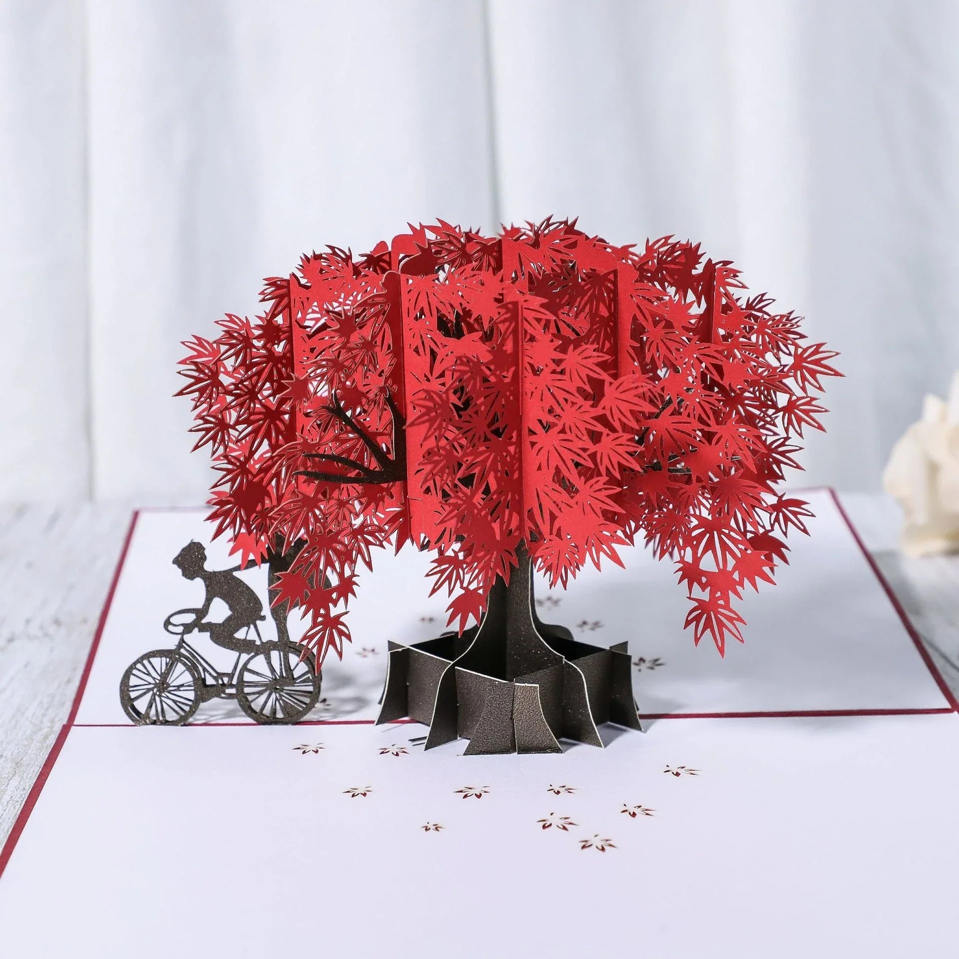Enchanting 3D pop-up wedding invitation cards with laser-cut designs and floral motifs