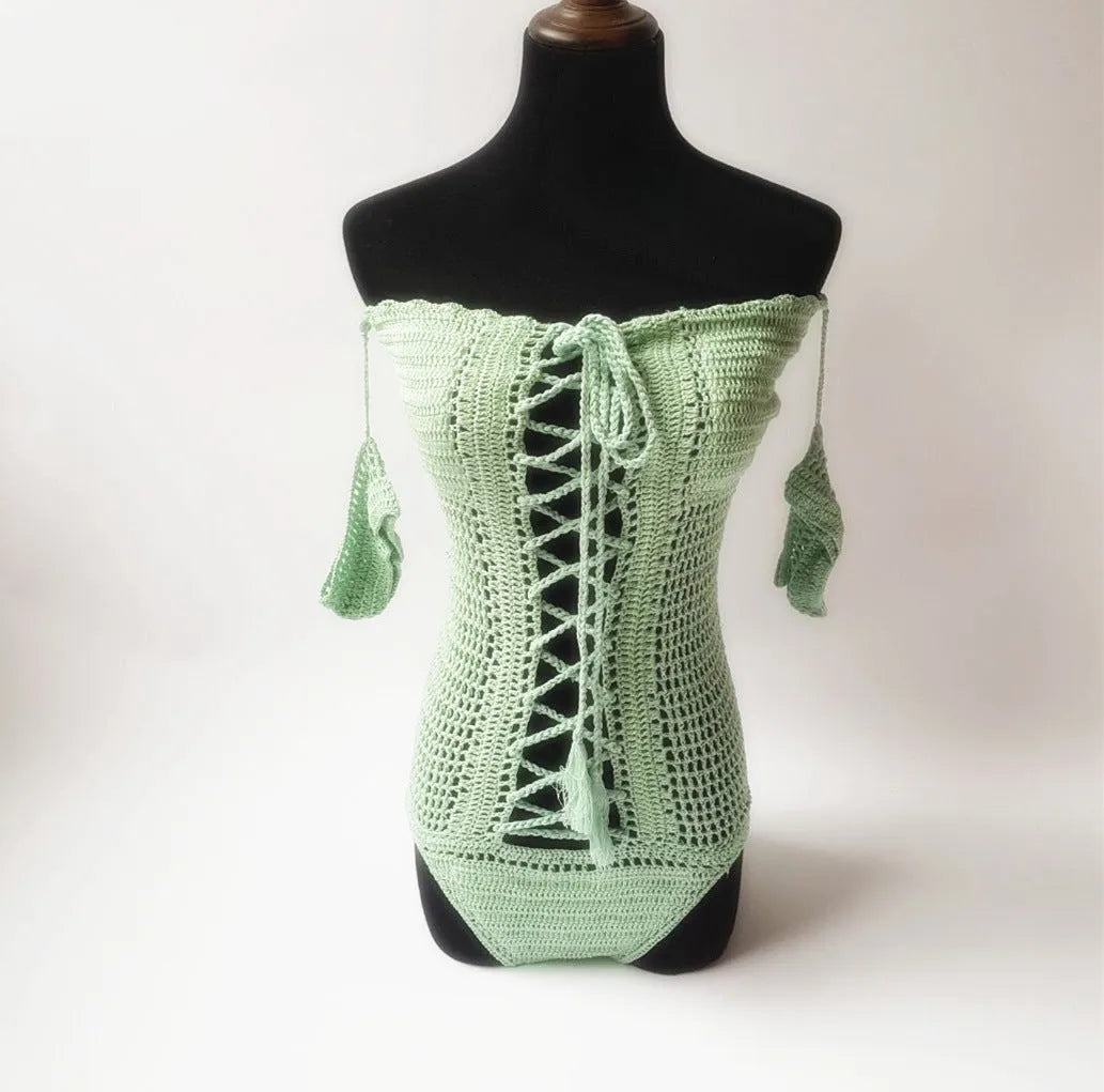 European and American sized off-shoulder one-piece swimsuit in aqua green, laid flat