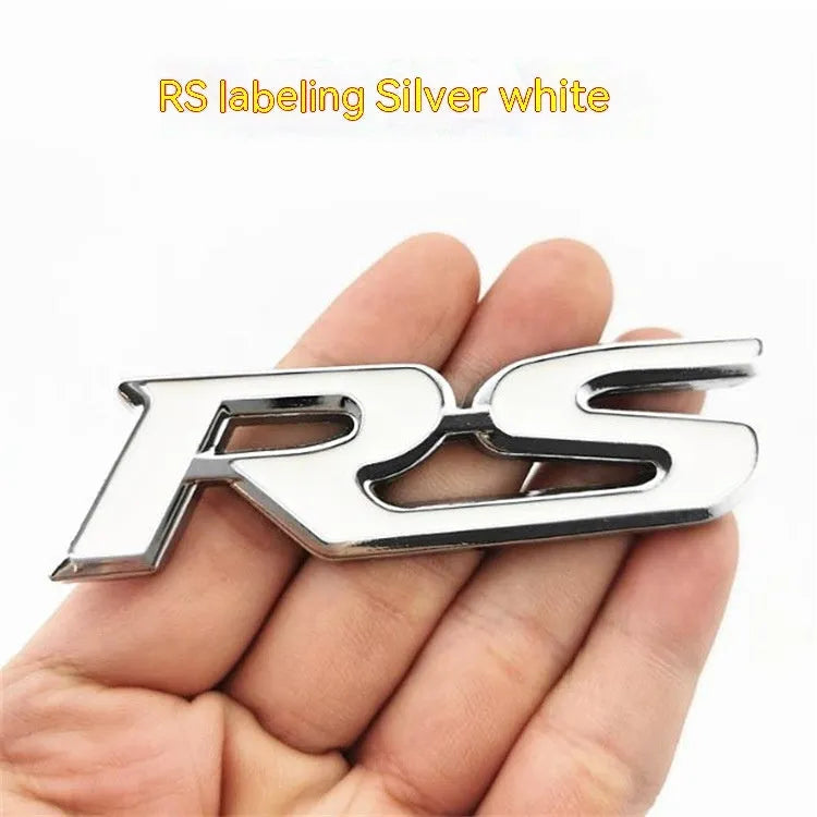 Zinc alloy metal car sticker with RS design measuring 9 by 2.4 centimetres