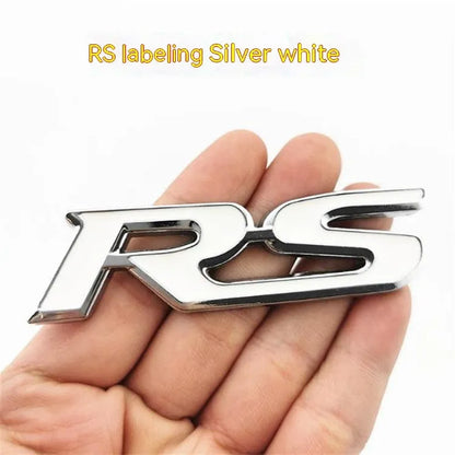 Zinc alloy metal car sticker with RS design measuring 9 by 2.4 centimetres