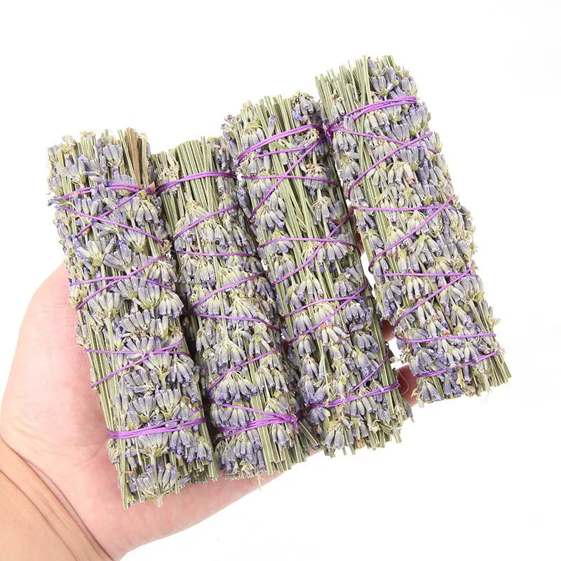 A single 4-inch long natural dried flower aromatherapy stick with lavender fragrance on a plain background.