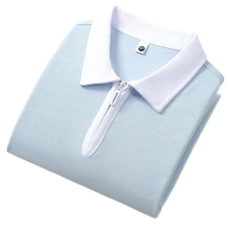 A navy blue nylon polo shirt with a zipper and lapel front closure and short sleeves.