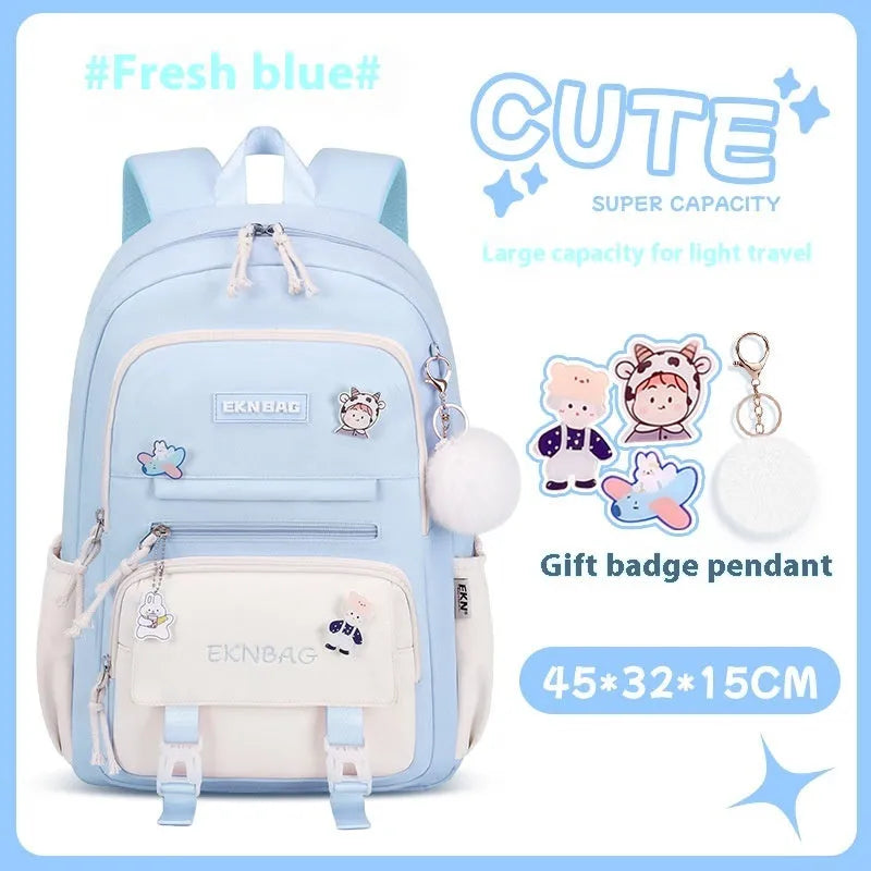 Pink waterproof Oxford cloth school backpack for girls with curved shoulder straps, shown with matching pencil case.