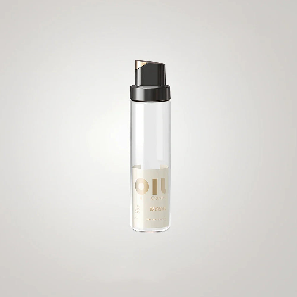 Transparent glass oil kettle with automatic gravity sensor mechanism in kitchen setting