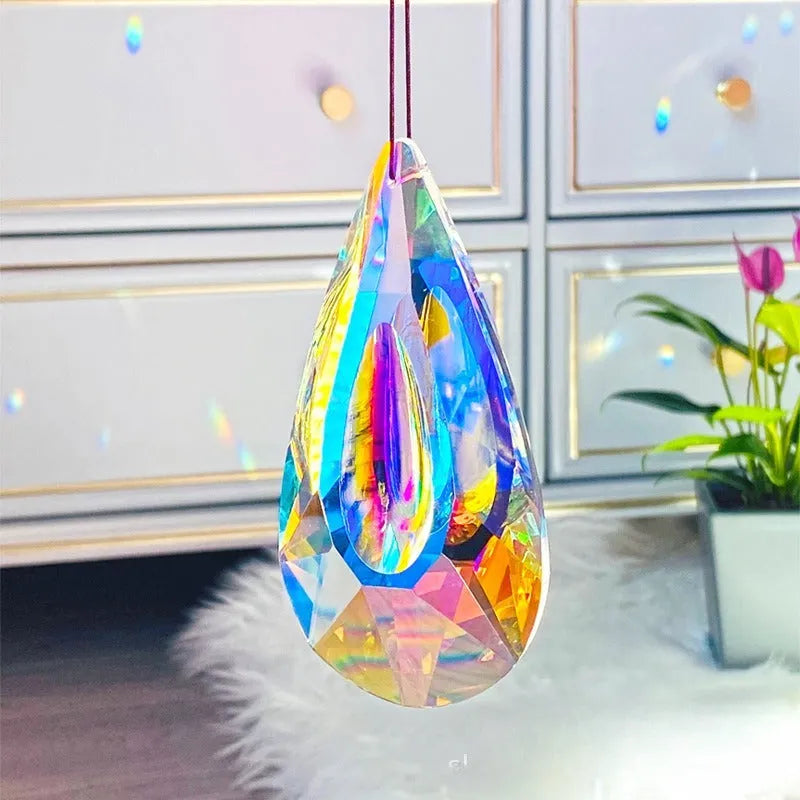 Electroplated crystal pendant ornament catching light, available in Chafer, Christmas Tree, earrings, and Longans styles.