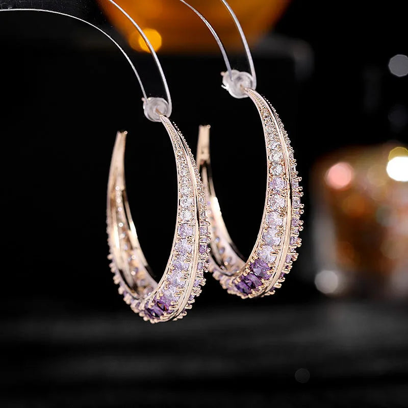 Geometric women's hoop earrings in gold white, purple, green, black, or silver white zirconium plating.