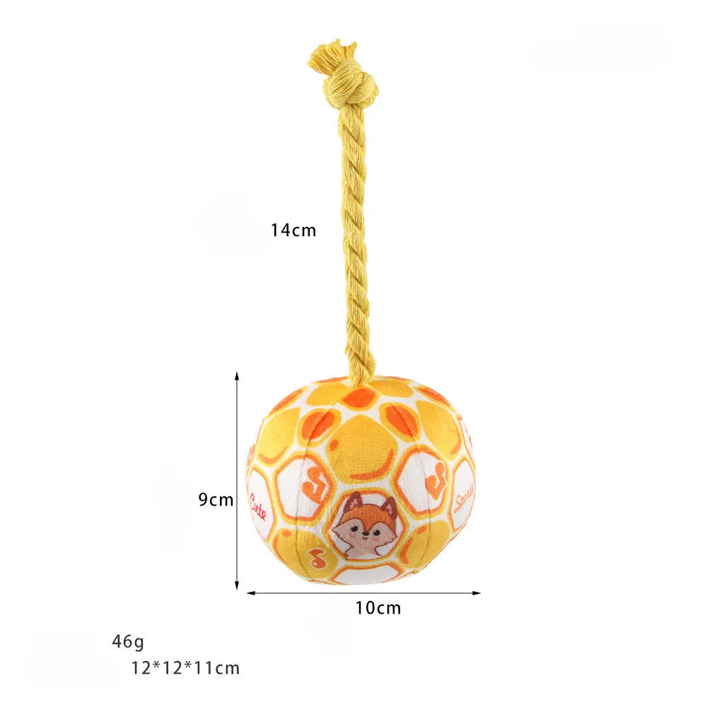 Blue and yellow elastic football dog toy with an attached cotton rope for tug of war and chewing.