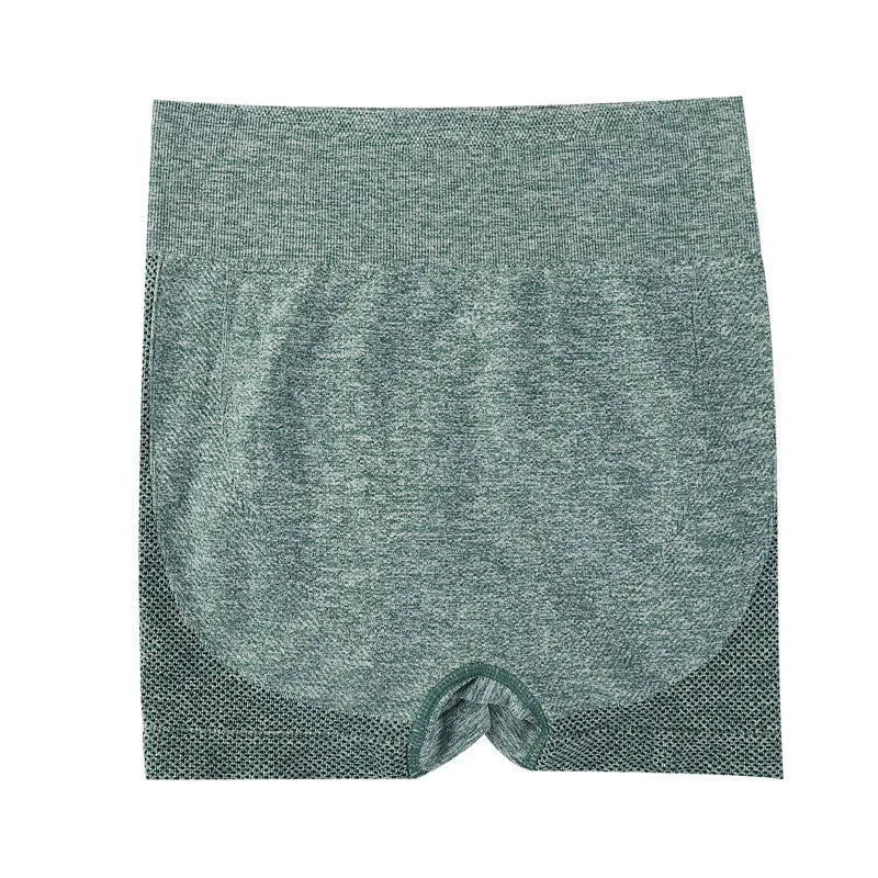 Women's high-waisted black seamless yoga shorts for fitness and running.