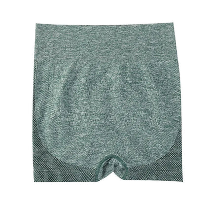Women's high-waisted black seamless yoga shorts for fitness and running.