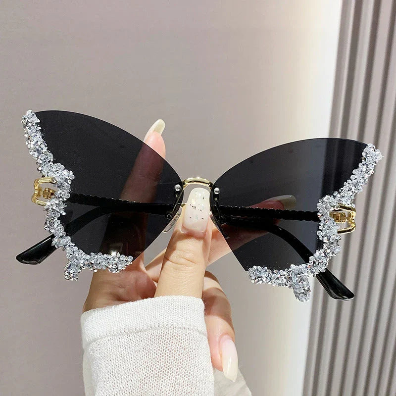 Luxurious diamond-studded butterfly sunglasses with oversized frames and a variety of color options