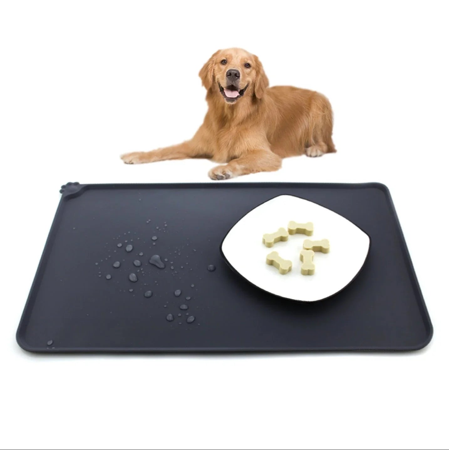Silicone pet food mat with raised edges and non-slip base to contain messes and protect floors during pet mealtimes