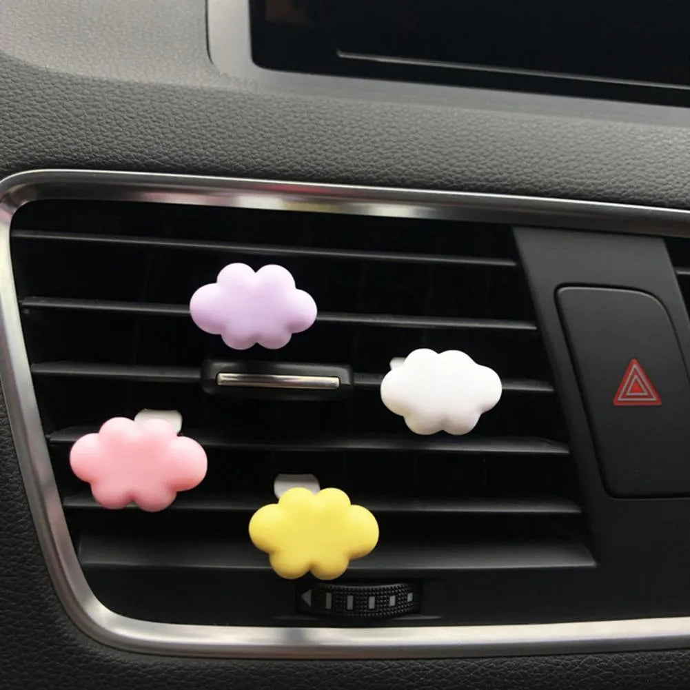 Resin car fragrance clip in light green colour showing 17mm x 27mm dimensions on car air vent