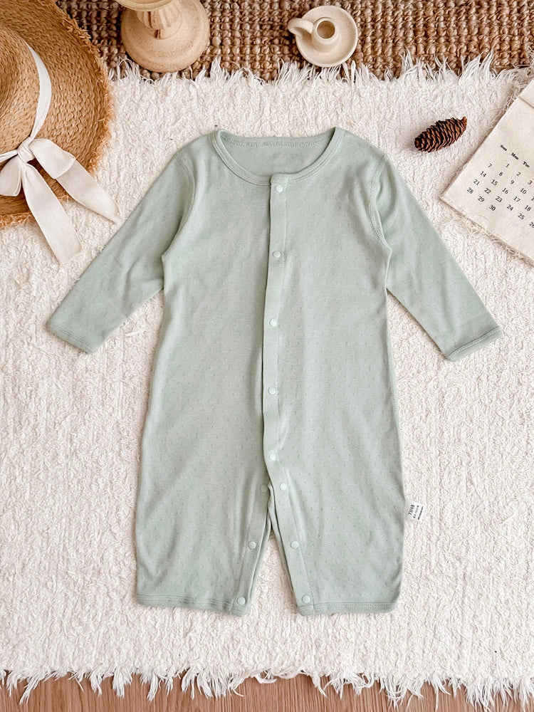 Pure cotton baby romper in blue with long sleeves and single-breasted closure, showing long climbing style design