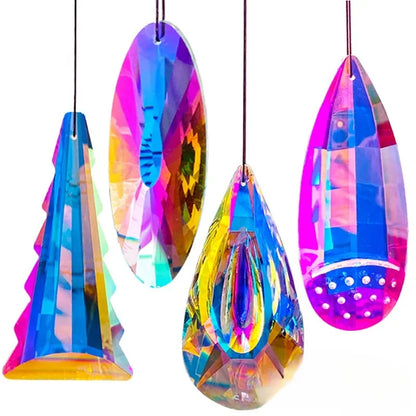 Rainbow-coloured crystal Christmas tree and garden pendant decoration hanging on a branch.