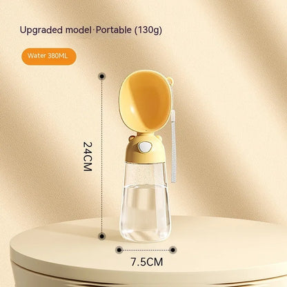 Portable dog water bottle with feeder bowl in brown, pink, or yellow colours for outdoor pet travel