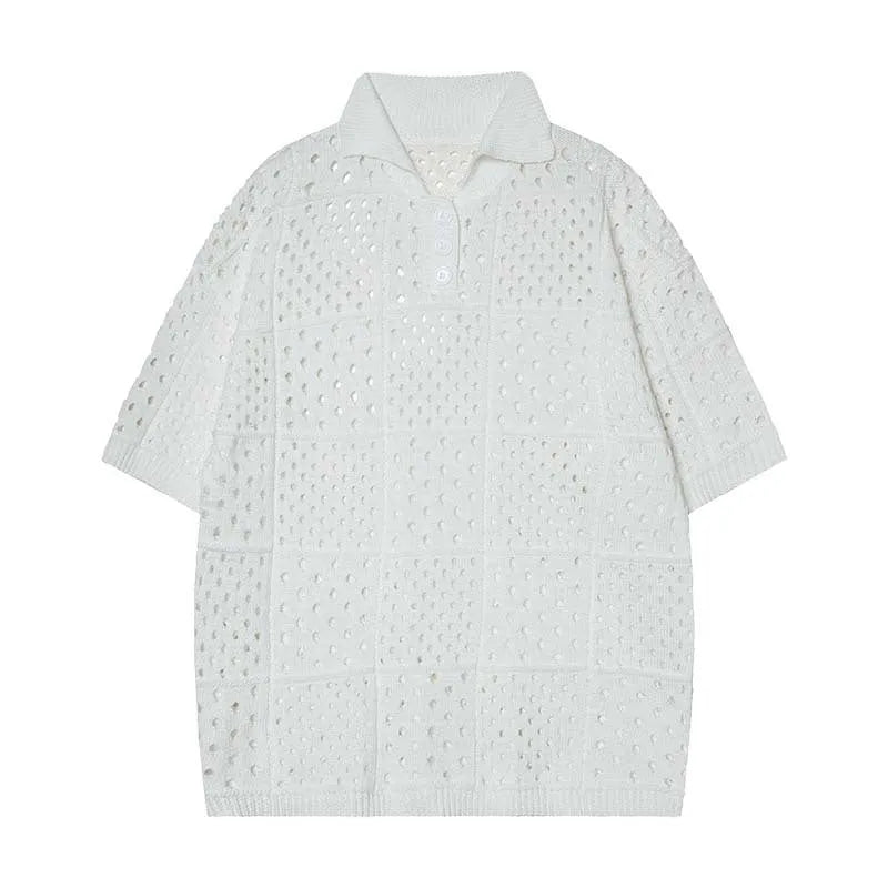 Knitted polo shirt short sleeve in solid black colour showing loose fit design