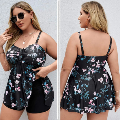 Women's one-piece swimsuit with a split colour floral print, shown on a mannequin.