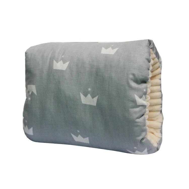 Adjustable cotton nursing pillow with various colorful designs, providing comfort and support for breastfeeding and bottle-feeding