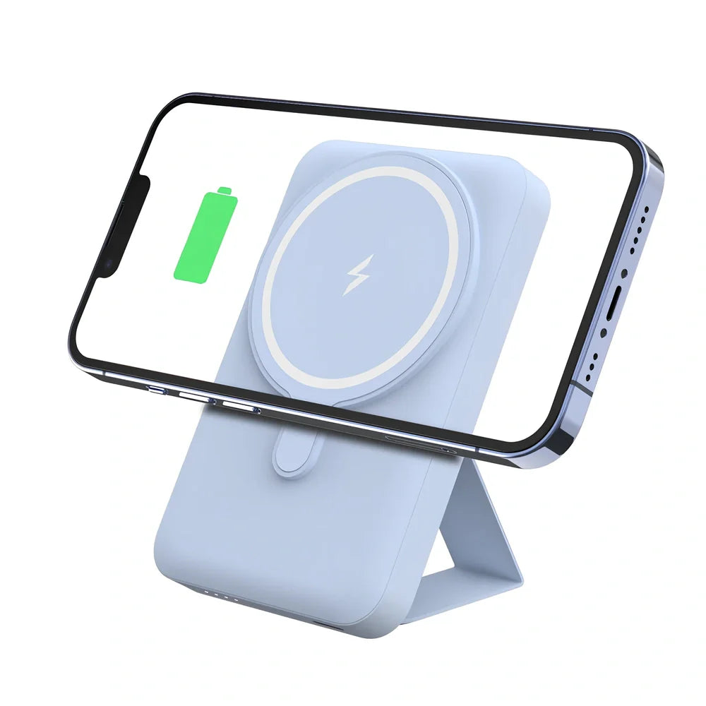 White Magsafe magnetic power bank showing magnetic charging side and USB ports