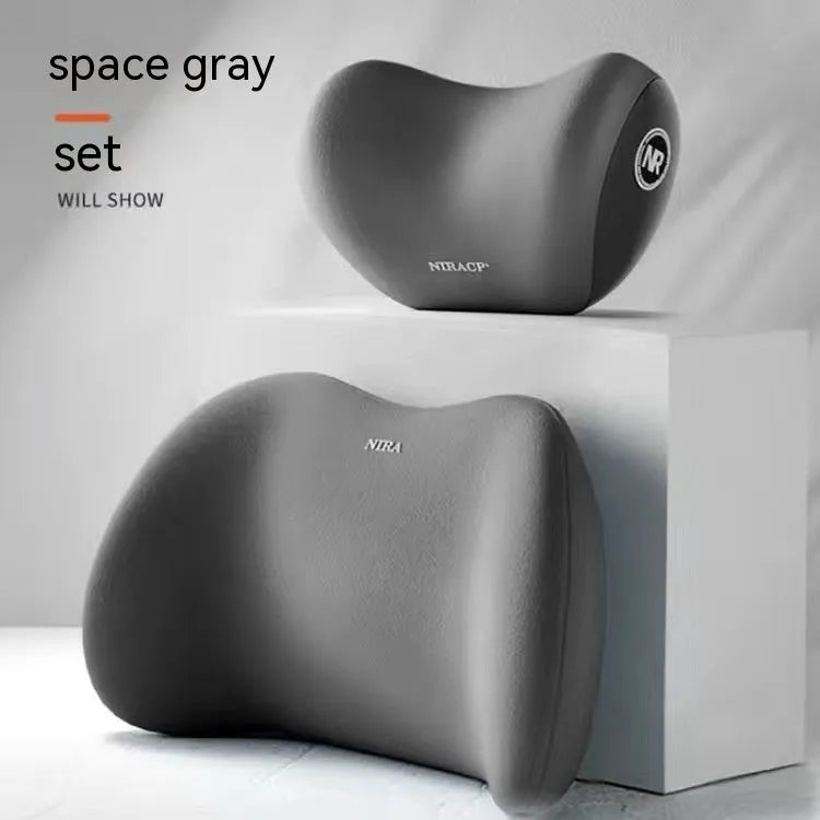 Black automotive headrest pillow and lumbar support pillow set with memory foam filler on a car seat