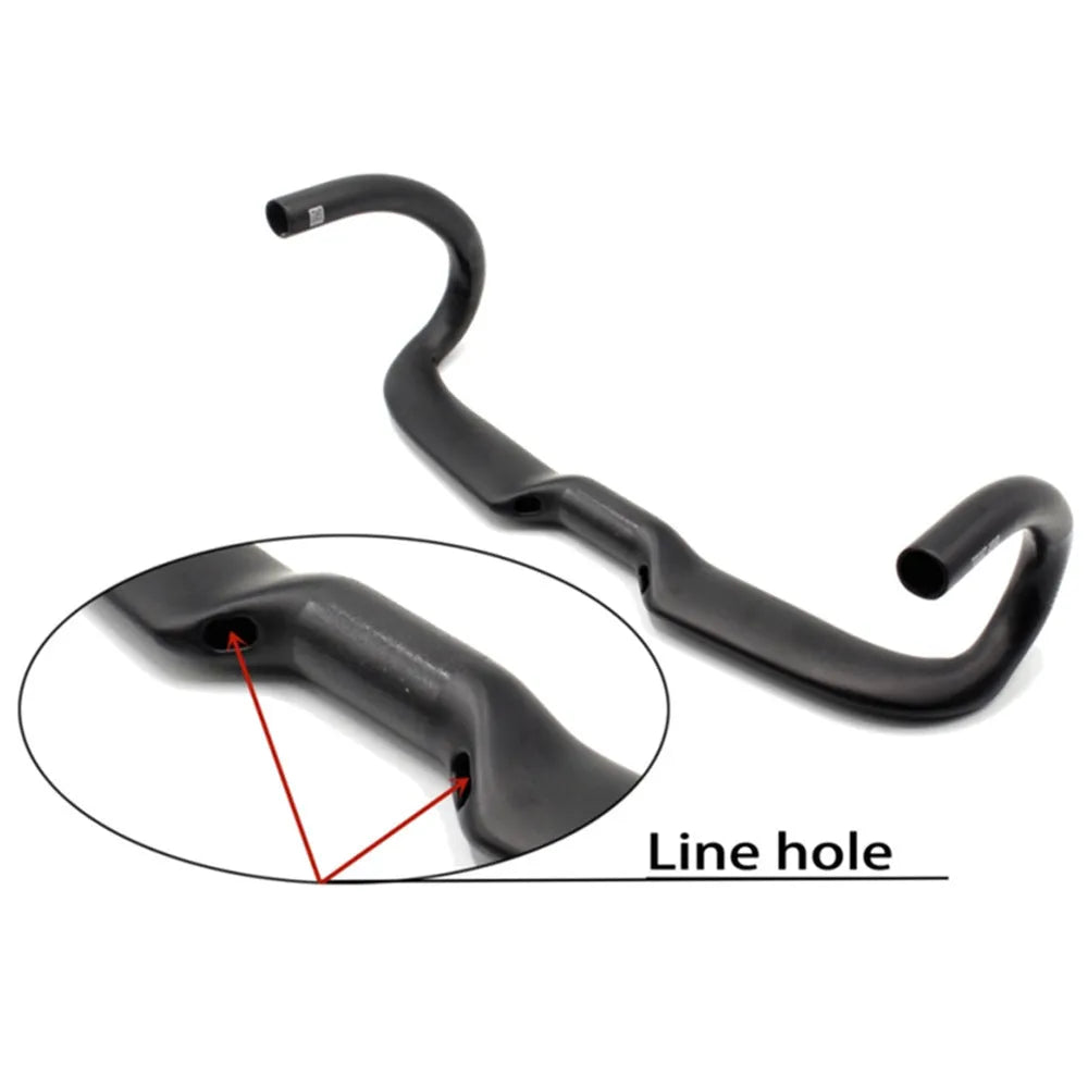 Matte black carbon fibre road bike drop handlebar showing bent shape.