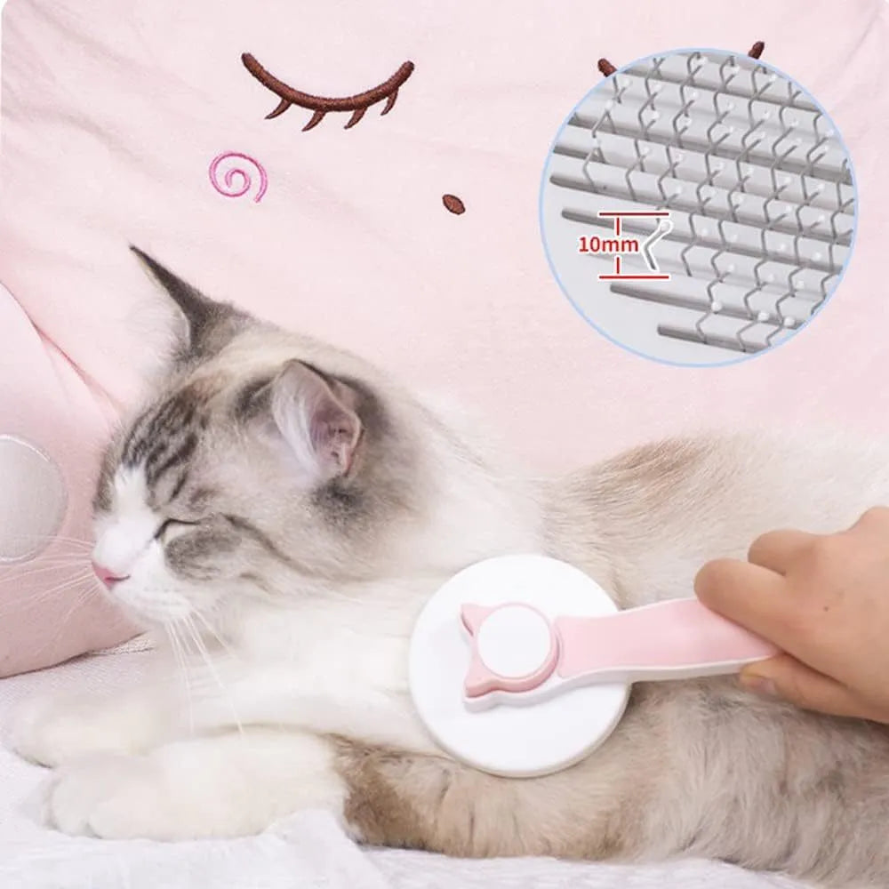 Self-cleaning cat brush with blue handle and metal needles for grooming pets