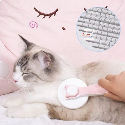 Self-cleaning cat brush with blue handle and metal needles for grooming pets