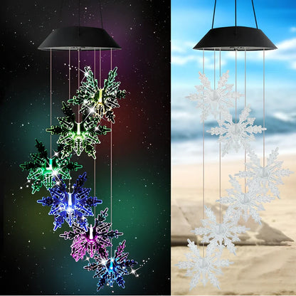 Solar-powered wind chime garden lamp with hummingbird design, automatic day-night operation, waterproof construction