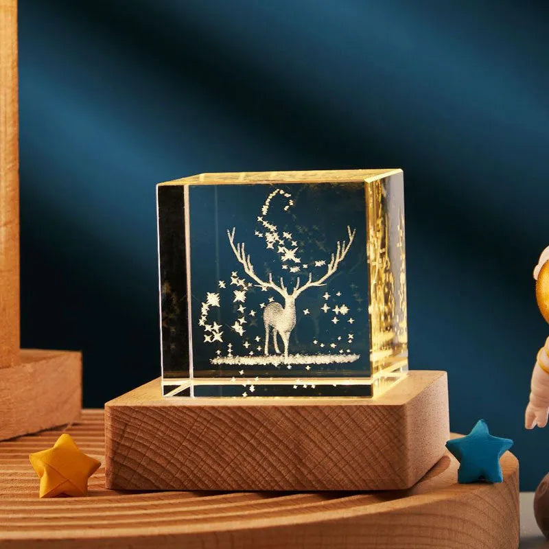 3D crystal cube night lamp showing transparent glass with internal engraving and warm light illumination