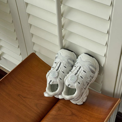 Pair of solid-colour casual shoes with a PU leather mesh upper, shown in beige.