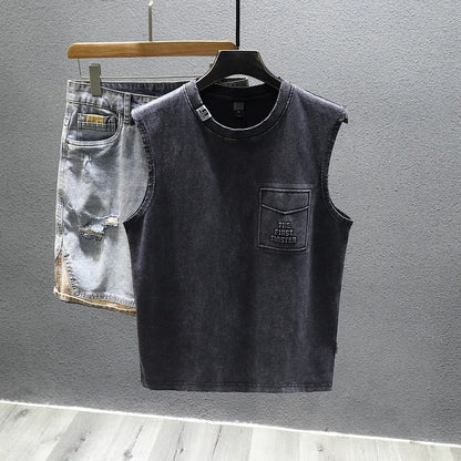 Men's solid colour loose fit cotton sleeveless t-shirt on a hanger, shown in white and black.