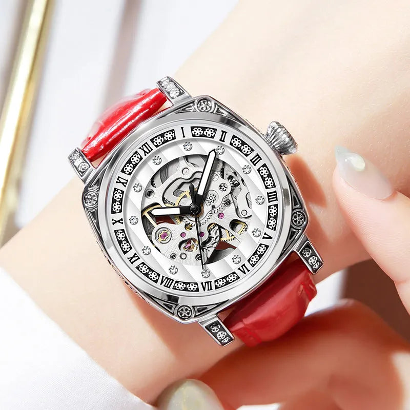 Mechanical watch with luminous hands on leather belt, stainless steel case, showing black colour option