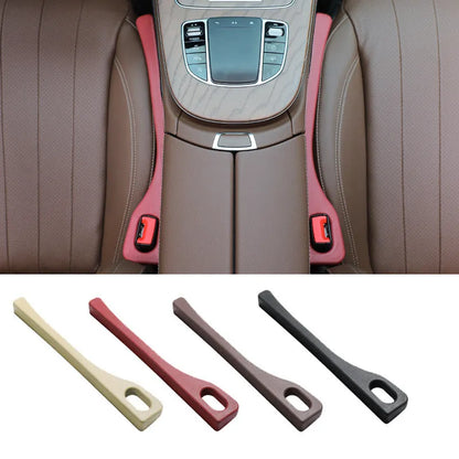 Flexible polyurethane car seat gap filler strip in selected colour next to car keys and phone.