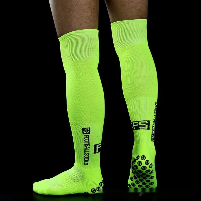 Anti-slip dispensing knee-length football socks in polyester, available in ten colours including black, white, red, and blue.