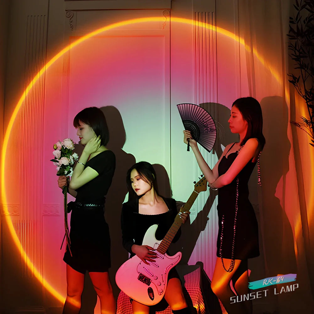 Sunset projection lamp with remote control showing rainbow colour lighting effects on wall