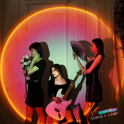 Sunset projection lamp with remote control showing rainbow colour lighting effects on wall