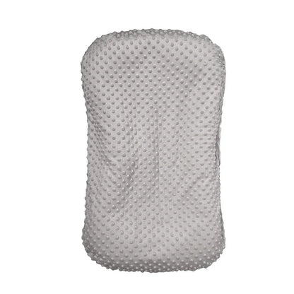 Portable crib with interchangeable fabric cover showing 75x45cm dimensions and multiple colour options