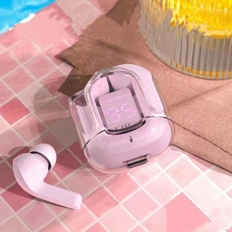 Transparent capsule case containing true wireless Bluetooth earbuds in light blue, showing digital display.