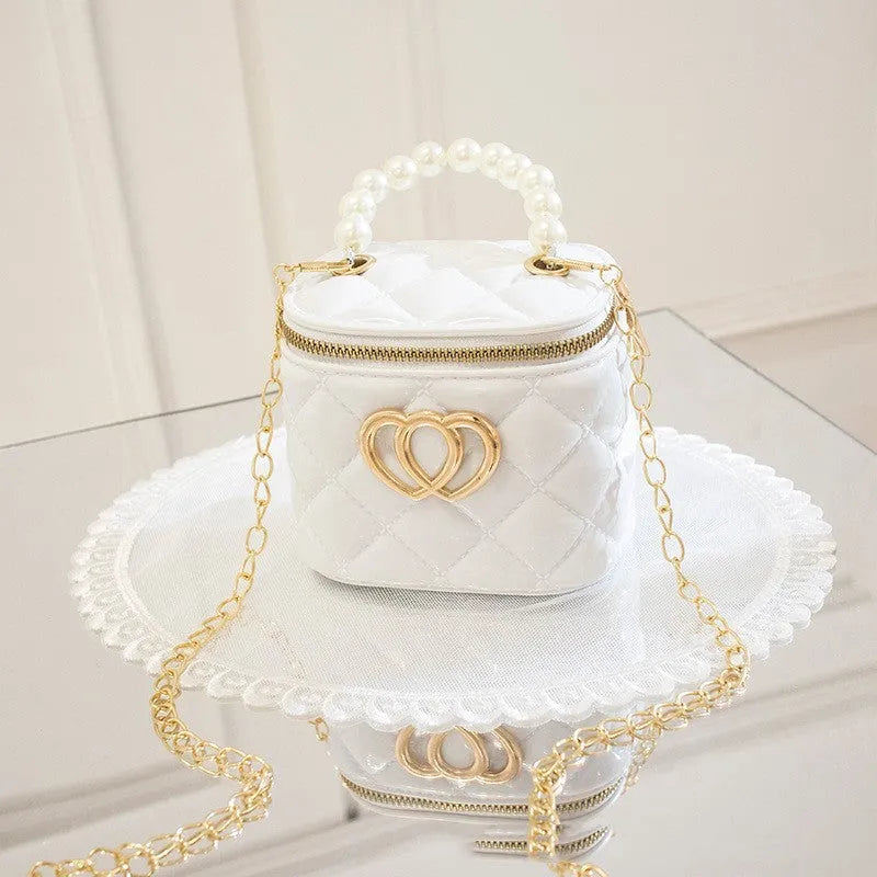 PVC bucket-style gel bag with a heart-shaped pattern, shown in apricot colour.
