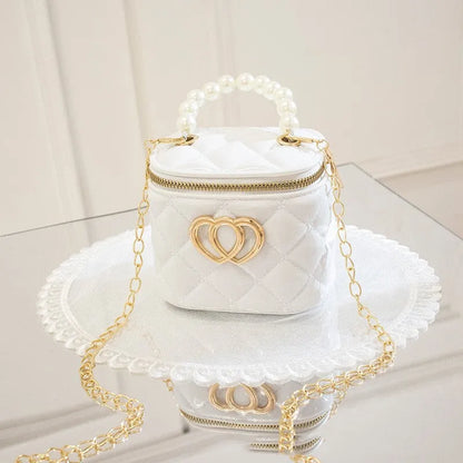 PVC bucket-style gel bag with a heart-shaped pattern, shown in apricot colour.
