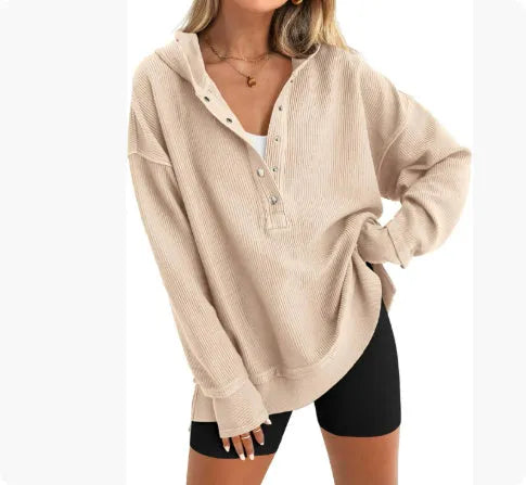 Women's loose raglan sleeve sweater in peacock green colour, showing long sleeves and casual pullover style