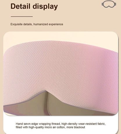 Gray double-sided sleep mask showing cool ice silk side and warm cotton side with adjustable magic tape closure