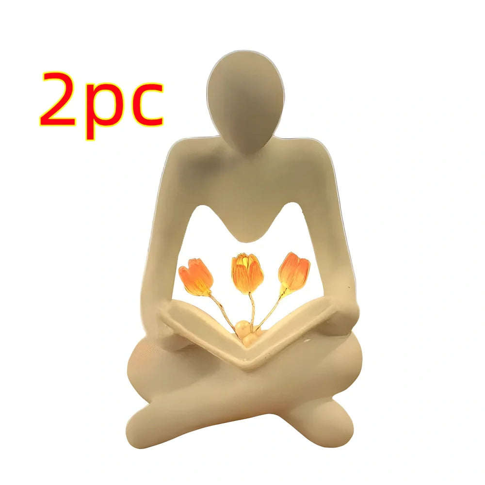 Nordic abstract thinker statue with tulip book night lamp measuring 7x6.3x11.5cm