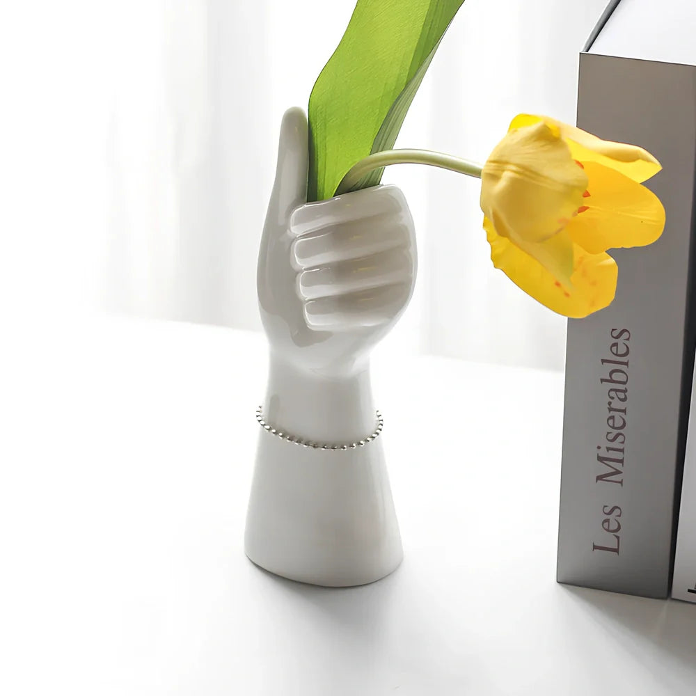 Ceramic human body vase with colour glaze finish showing decorative figures patterns, displayed as hanging ornament