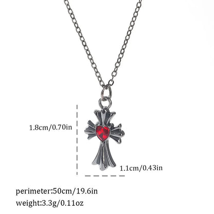 Gothic style zinc alloy necklace with bat pendant on a silver chain against dark background.