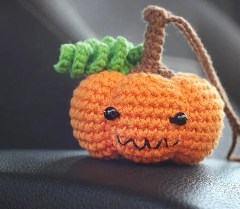 Soft, hand-woven plush car hanging ornament in a cartoon character design.